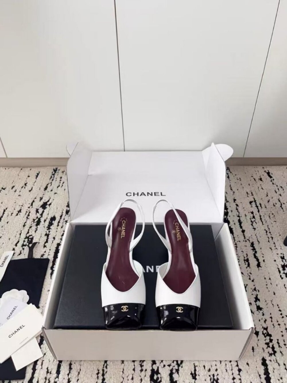 CHANEL Black‑White Cap‑Toe Slingback Block Heel Pumps
